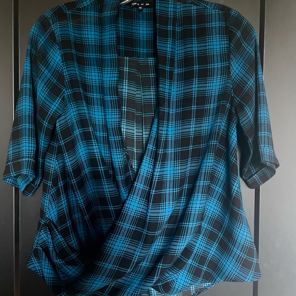 Plum blue and black plaid blouse with crossover design